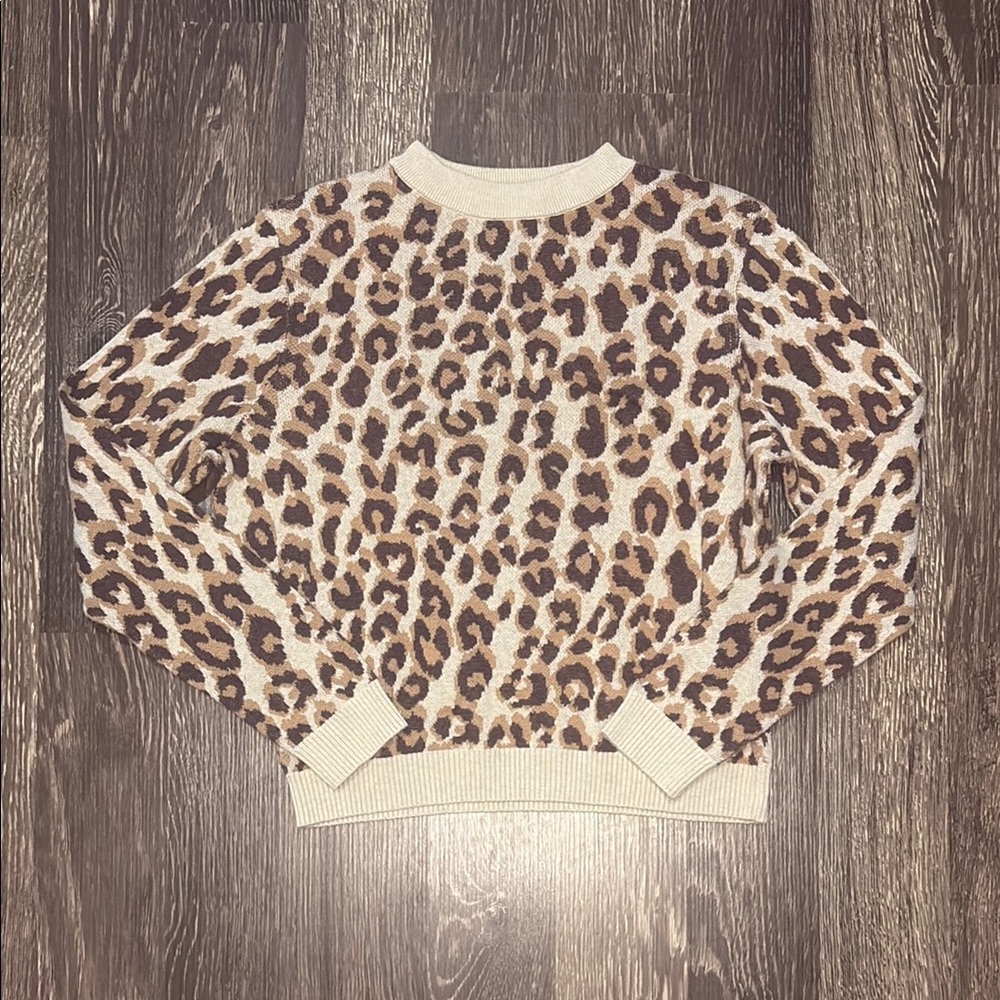 Woman’s leopard print sweater size small